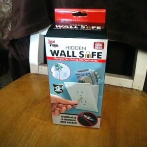 Hidden outlet wall safe
